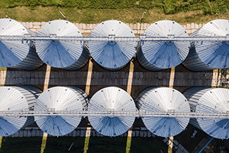 Aerial photo of grain storage bins.