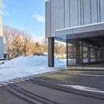 Photo of a parking lot outside of a business with snow